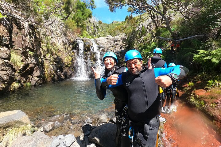 Coasteering along Madeira coastline — jumping into ocean pool